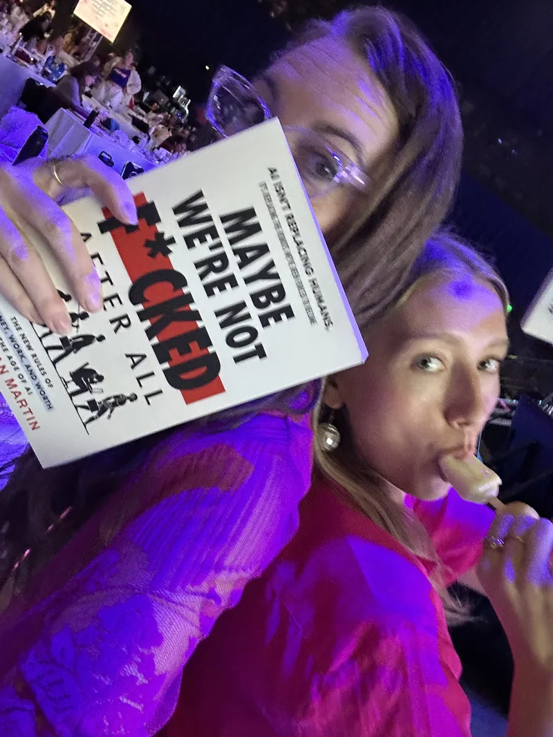 A reader holding Christian's book
