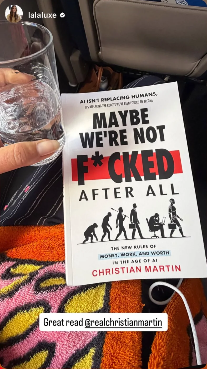 A reader holding Christian's book